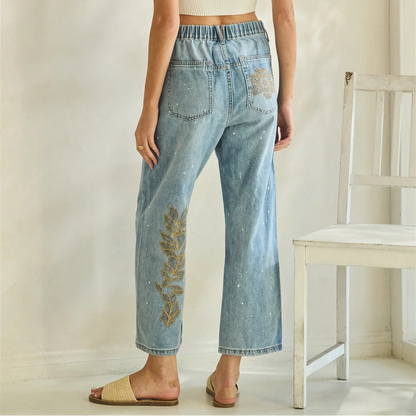 WASHED FLORAL EMBROIDERED DENIM PANTS